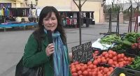 Susan buying fruit and veg in Spain