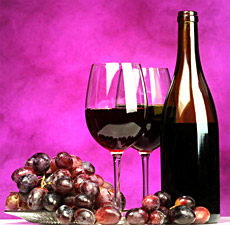 Red wine and grapes