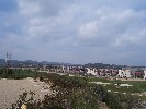 <strong>Another view of golf course and apartments from same spot as first photo</strong> <br /><em> Corvera Golf And Country Club community, taken on 13 March 2010 by Anjinsan</em>