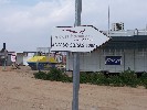 <strong>Photo of sign showing the way into the new airport</strong> <br /><em> Corvera Golf And Country Club community, taken on 13 March 2010 by Anjinsan</em>