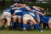 Hugging Stock Photo: Rugby Scrum Teamwork in Action