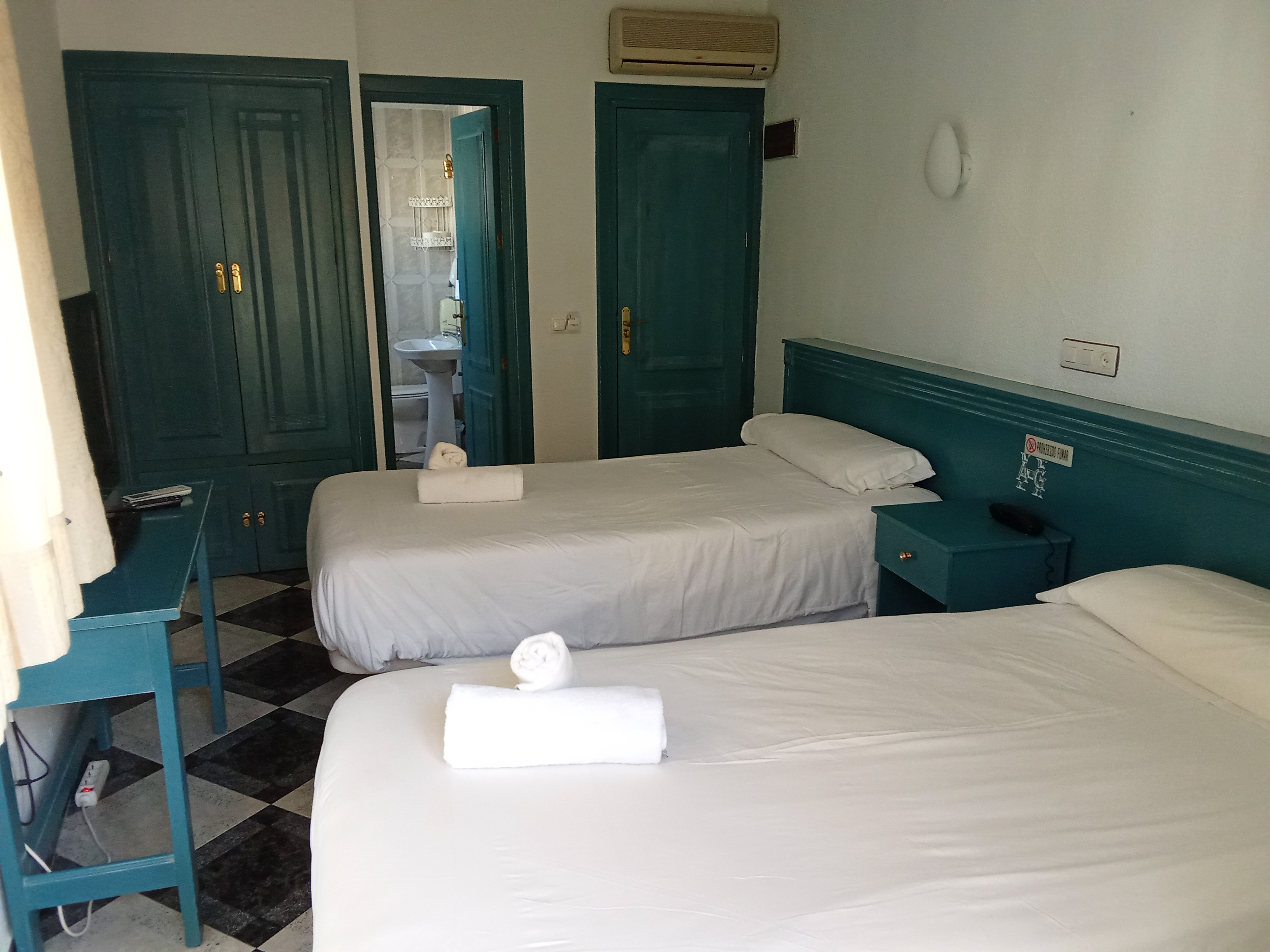 People struggle against the wind and rain in Malmö, Sweden, after a storm reached southern Sweden, Saturday Oct. 4, 2025. (Johan Nilsson/TT via AP)