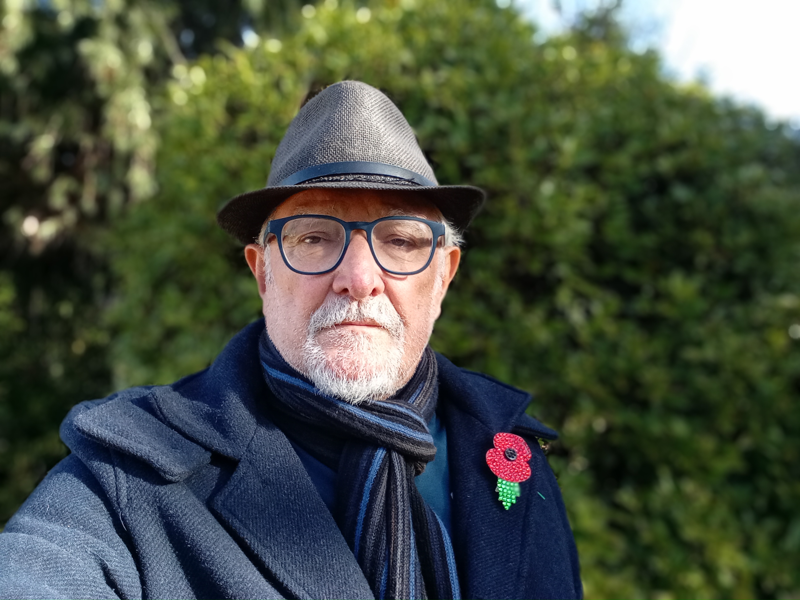 People struggle against the wind and rain in Malmö, Sweden, after a storm reached southern Sweden, Saturday Oct. 4, 2025. (Johan Nilsson/TT via AP)