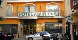 People struggle against the wind and rain in Malmö, Sweden, after a storm reached southern Sweden, Saturday Oct. 4, 2025. (Johan Nilsson/TT via AP)