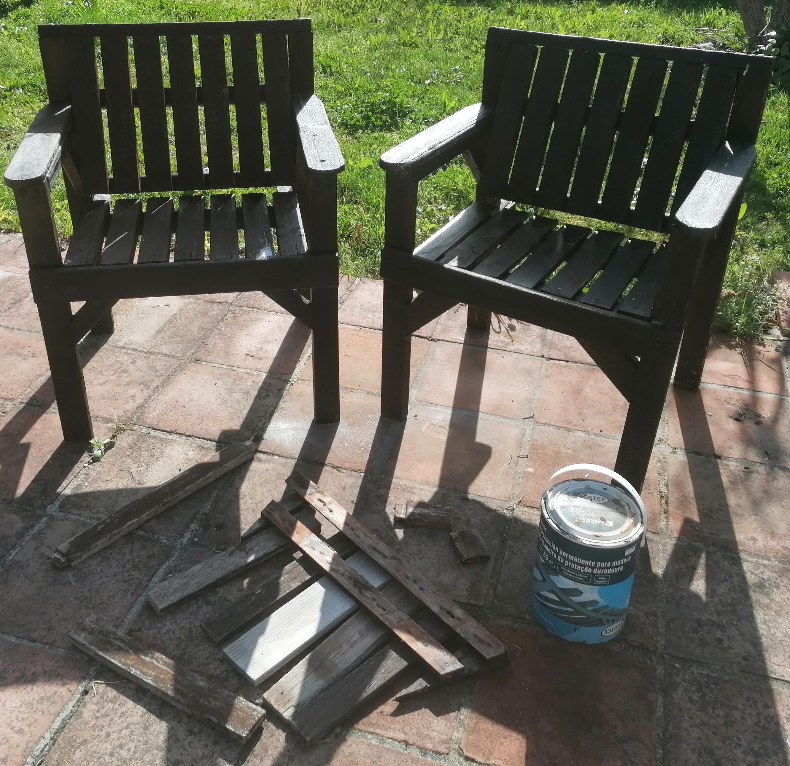 A puréed and simmering carrot soup in a pot with a spoon