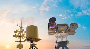 People struggle against the wind and rain in Malmö, Sweden, after a storm reached southern Sweden, Saturday Oct. 4, 2025. (Johan Nilsson/TT via AP)