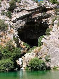 People struggle against the wind and rain in Malmö, Sweden, after a storm reached southern Sweden, Saturday Oct. 4, 2025. (Johan Nilsson/TT via AP)