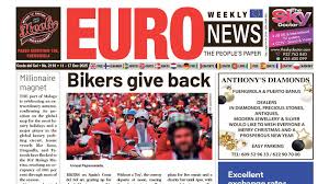 People struggle against the wind and rain in Malmö, Sweden, after a storm reached southern Sweden, Saturday Oct. 4, 2025. (Johan Nilsson/TT via AP)