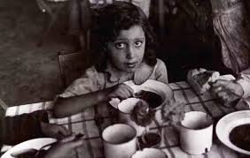 People struggle against the wind and rain in Malmö, Sweden, after a storm reached southern Sweden, Saturday Oct. 4, 2025. (Johan Nilsson/TT via AP)