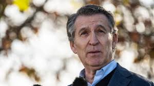 People struggle against the wind and rain in Malmö, Sweden, after a storm reached southern Sweden, Saturday Oct. 4, 2025. (Johan Nilsson/TT via AP)