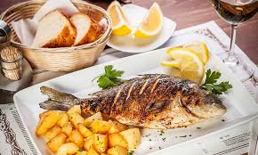 People struggle against the wind and rain in Malmö, Sweden, after a storm reached southern Sweden, Saturday Oct. 4, 2025. (Johan Nilsson/TT via AP)