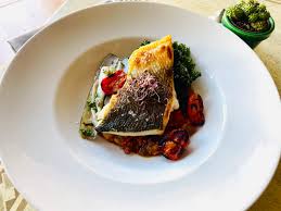 People struggle against the wind and rain in Malmö, Sweden, after a storm reached southern Sweden, Saturday Oct. 4, 2025. (Johan Nilsson/TT via AP)