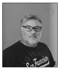 People struggle against the wind and rain in Malmö, Sweden, after a storm reached southern Sweden, Saturday Oct. 4, 2025. (Johan Nilsson/TT via AP)