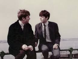 People struggle against the wind and rain in Malmö, Sweden, after a storm reached southern Sweden, Saturday Oct. 4, 2025. (Johan Nilsson/TT via AP)