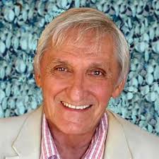 People struggle against the wind and rain in Malmö, Sweden, after a storm reached southern Sweden, Saturday Oct. 4, 2025. (Johan Nilsson/TT via AP)