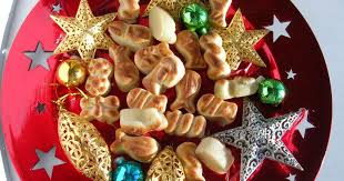 People struggle against the wind and rain in Malmö, Sweden, after a storm reached southern Sweden, Saturday Oct. 4, 2025. (Johan Nilsson/TT via AP)