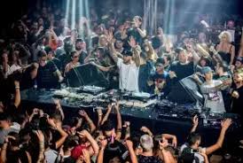 People struggle against the wind and rain in Malmö, Sweden, after a storm reached southern Sweden, Saturday Oct. 4, 2025. (Johan Nilsson/TT via AP)