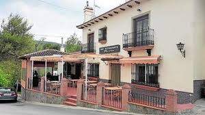 People struggle against the wind and rain in Malmö, Sweden, after a storm reached southern Sweden, Saturday Oct. 4, 2025. (Johan Nilsson/TT via AP)