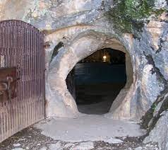 People struggle against the wind and rain in Malmö, Sweden, after a storm reached southern Sweden, Saturday Oct. 4, 2025. (Johan Nilsson/TT via AP)