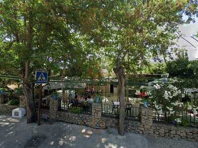 People struggle against the wind and rain in Malmö, Sweden, after a storm reached southern Sweden, Saturday Oct. 4, 2025. (Johan Nilsson/TT via AP)