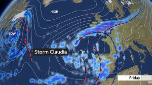 People struggle against the wind and rain in Malmö, Sweden, after a storm reached southern Sweden, Saturday Oct. 4, 2025. (Johan Nilsson/TT via AP)