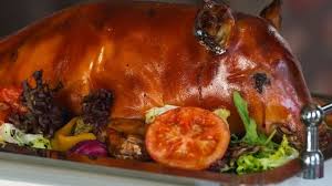 People struggle against the wind and rain in Malmö, Sweden, after a storm reached southern Sweden, Saturday Oct. 4, 2025. (Johan Nilsson/TT via AP)