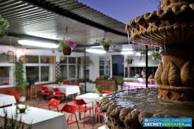 People struggle against the wind and rain in Malmö, Sweden, after a storm reached southern Sweden, Saturday Oct. 4, 2025. (Johan Nilsson/TT via AP)