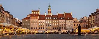 People struggle against the wind and rain in Malmö, Sweden, after a storm reached southern Sweden, Saturday Oct. 4, 2025. (Johan Nilsson/TT via AP)